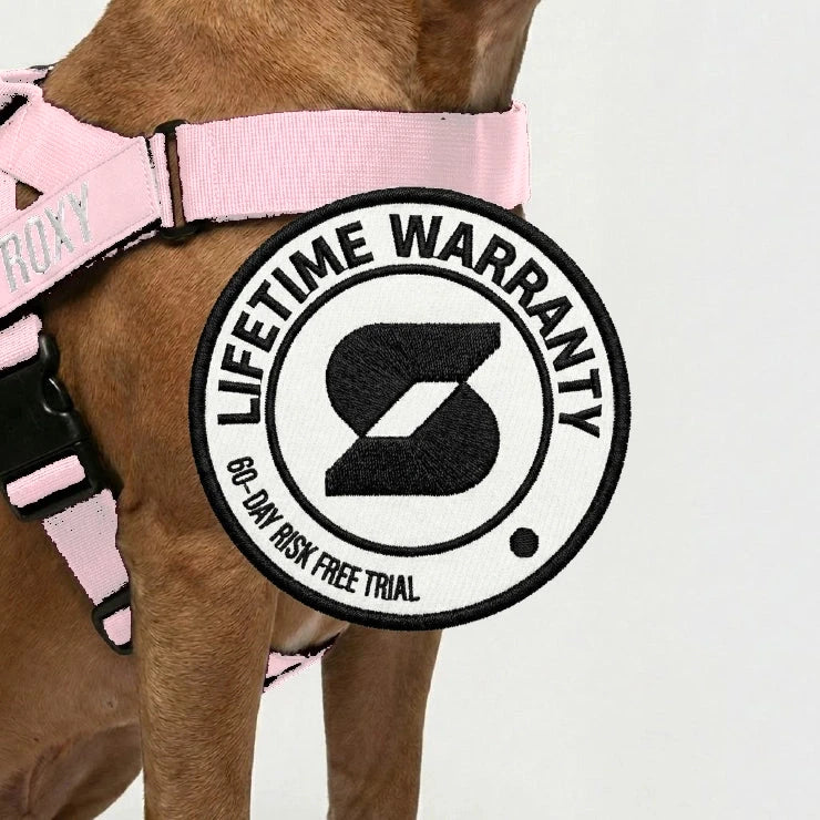 Lifetime Warranty, 60-day risk free trial badge over a dog wearing the Sakura harness