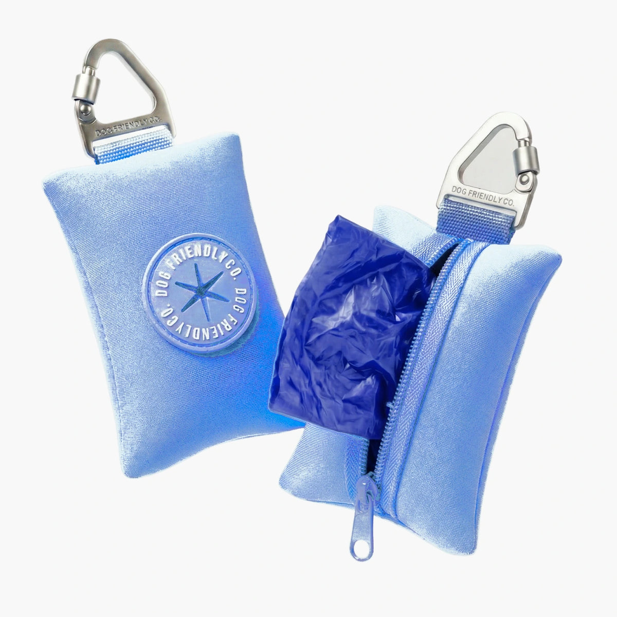 Two Air poop bag holders, one open with a roll of bags inside